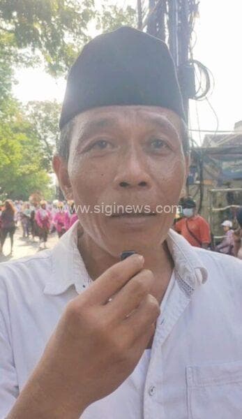 Cak Kusnan, Ketua Panitia Sedekah Bumi Dukuh Karangan, Kelurahan Babatan, Kecamatan Wiyung, Kota Surabaya. (Foto : jero/siginews.com)